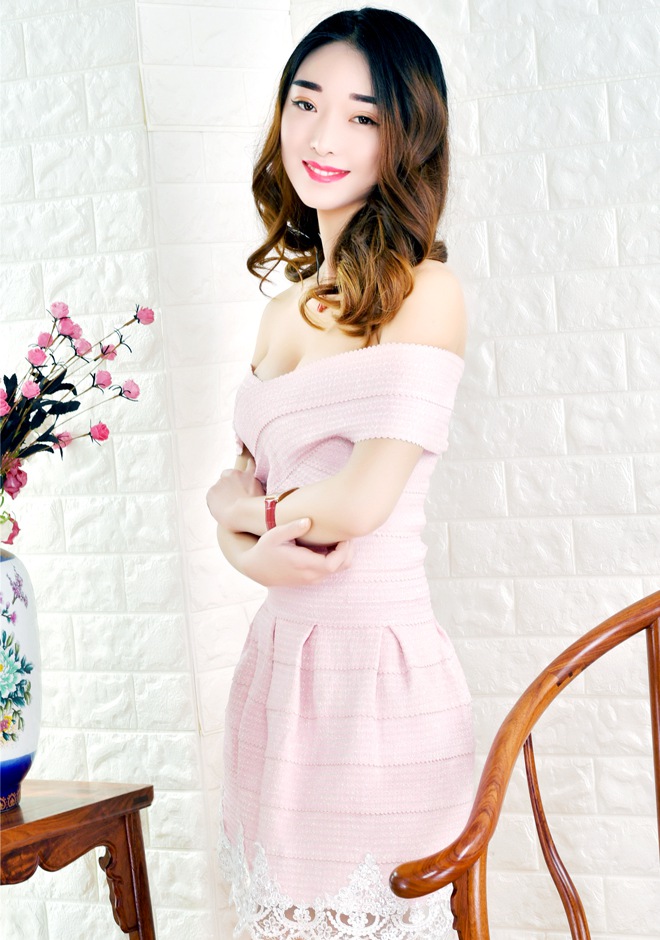Single girl Xin (Pearl) 48 years old