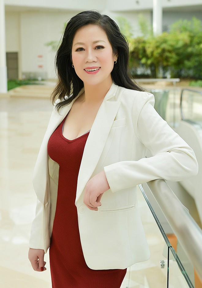 Single girl Caifeng (Carol) 53 years old