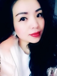 Asian single Minyi from Jinghe, China