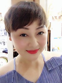 Asian woman Mingxiu from Nanning, China