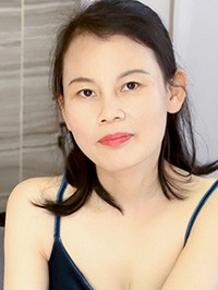 Asian woman Jianhua from Lingxi, China